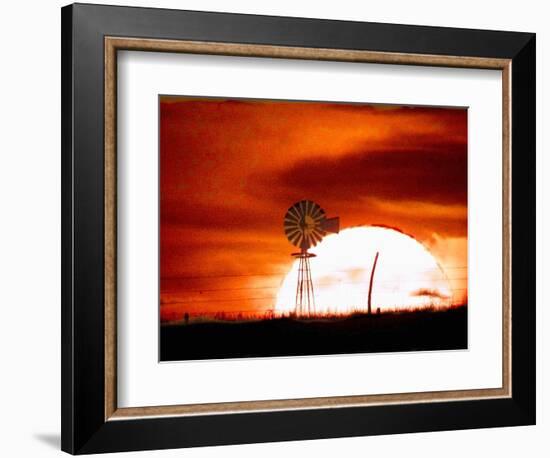 A Blazing Sun Drops Behind a Windmill-null-Framed Photographic Print