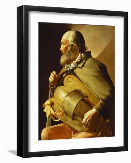 A Blind Hurdy-Gurdy Player, Seated Three-Quarter Length, in Profile to the Left-Georges de La Tour-Framed Giclee Print