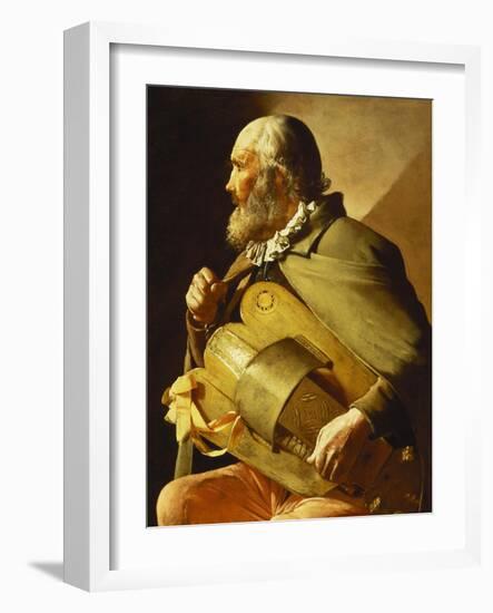 A Blind Hurdy-Gurdy Player, Seated Three-Quarter Length, in Profile to the Left-Georges de La Tour-Framed Giclee Print