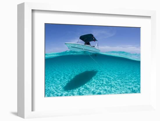 A Boat Is Anchored in the Clear Blue Tropical Waters Off Staniel Cay, Exuma, Bahamas-James White-Framed Photographic Print