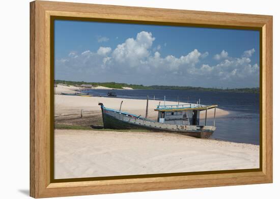 A Boat Sits on Rio Preguicas River Bank Near Lencois Maranhenses National Park-Alex Saberi-Framed Premier Image Canvas