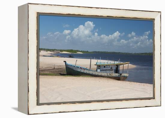 A Boat Sits on Rio Preguicas River Bank Near Lencois Maranhenses National Park-Alex Saberi-Framed Premier Image Canvas