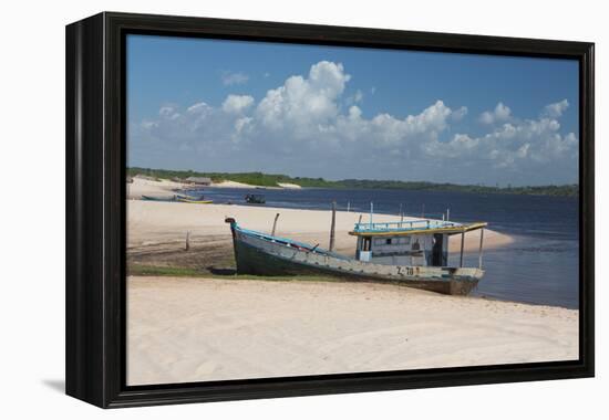 A Boat Sits on Rio Preguicas River Bank Near Lencois Maranhenses National Park-Alex Saberi-Framed Premier Image Canvas