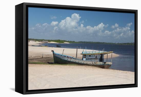 A Boat Sits on Rio Preguicas River Bank Near Lencois Maranhenses National Park-Alex Saberi-Framed Premier Image Canvas