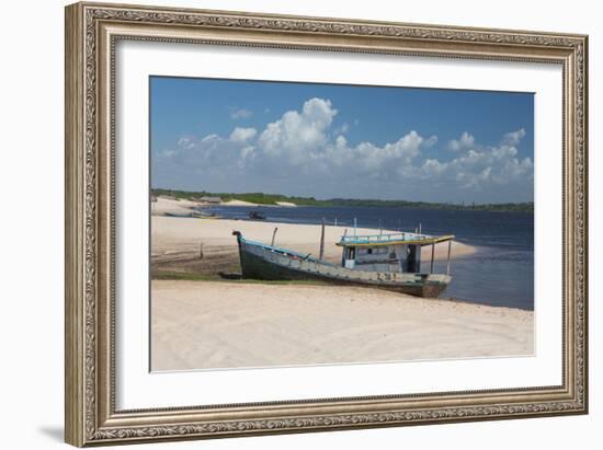 A Boat Sits on Rio Preguicas River Bank Near Lencois Maranhenses National Park-Alex Saberi-Framed Photographic Print