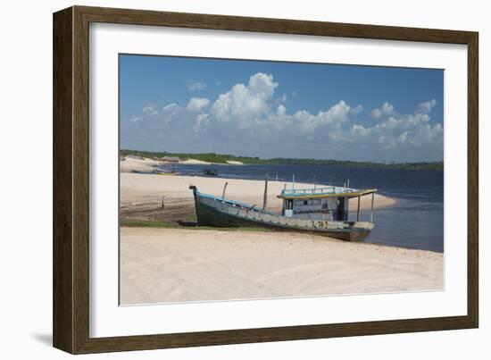 A Boat Sits on Rio Preguicas River Bank Near Lencois Maranhenses National Park-Alex Saberi-Framed Photographic Print