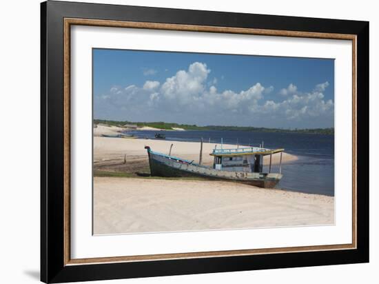 A Boat Sits on Rio Preguicas River Bank Near Lencois Maranhenses National Park-Alex Saberi-Framed Photographic Print