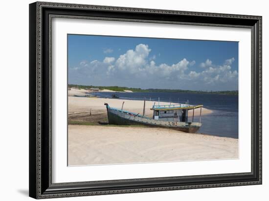 A Boat Sits on Rio Preguicas River Bank Near Lencois Maranhenses National Park-Alex Saberi-Framed Photographic Print