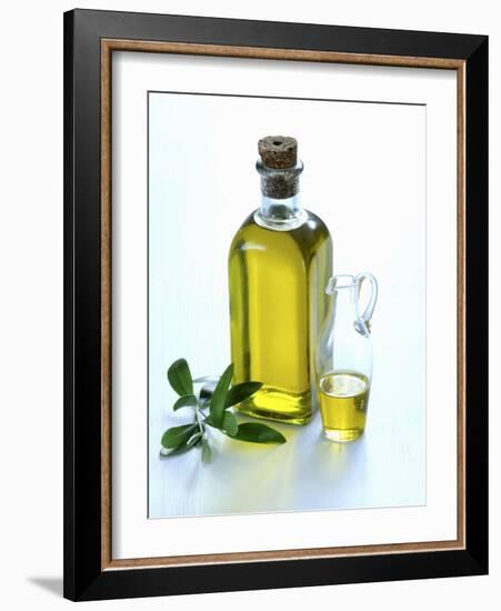 A Bottle and a Carafe of Olive Oil with an Olive Sprig-Alena Hrbkova-Framed Photographic Print