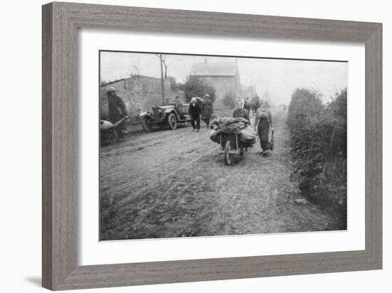 A British Soldier Helping a Woman Return to Her Village, France, 1918-null-Framed Giclee Print