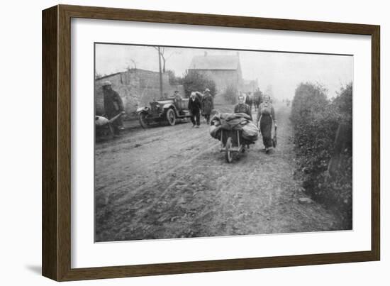 A British Soldier Helping a Woman Return to Her Village, France, 1918-null-Framed Giclee Print