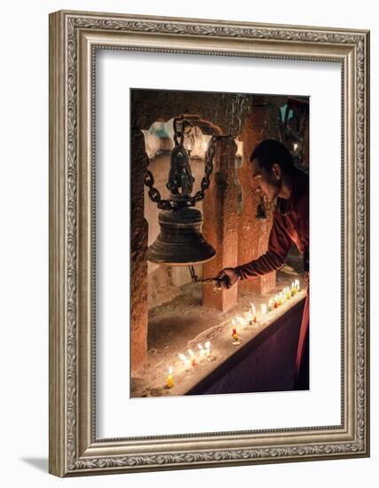 A Buddhist Monk Rings a Prayer Bell During the Full Moon Celebrations-Andrew Taylor-Framed Photographic Print