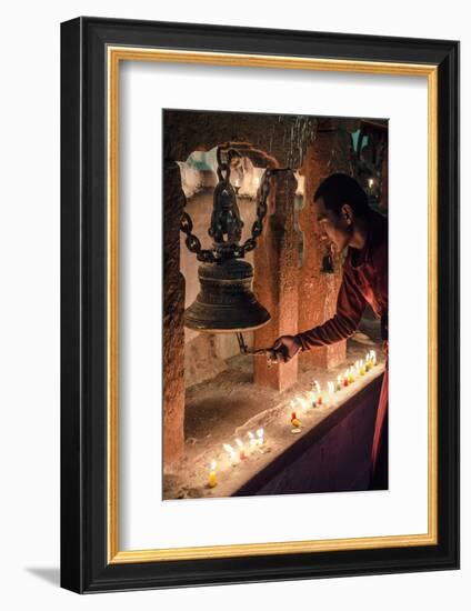 A Buddhist Monk Rings a Prayer Bell During the Full Moon Celebrations-Andrew Taylor-Framed Photographic Print