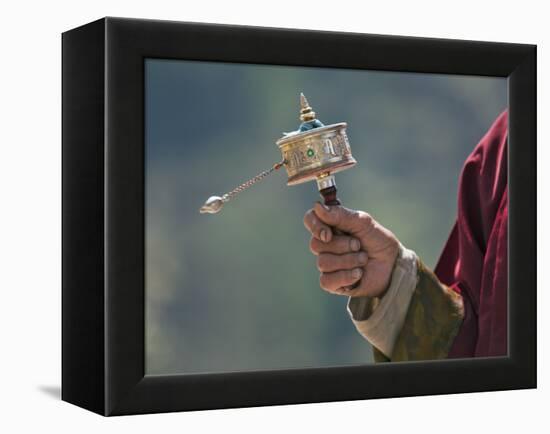 A Buddhist Spins His Hand-Held Prayer Wheel in a Clockwise Direction with the Help of a Weighted Ch-Nigel Pavitt-Framed Premier Image Canvas