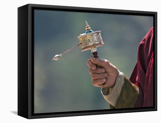 A Buddhist Spins His Hand-Held Prayer Wheel in a Clockwise Direction with the Help of a Weighted Ch-Nigel Pavitt-Framed Premier Image Canvas