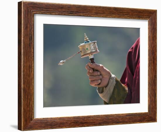 A Buddhist Spins His Hand-Held Prayer Wheel in a Clockwise Direction with the Help of a Weighted Ch-Nigel Pavitt-Framed Photographic Print