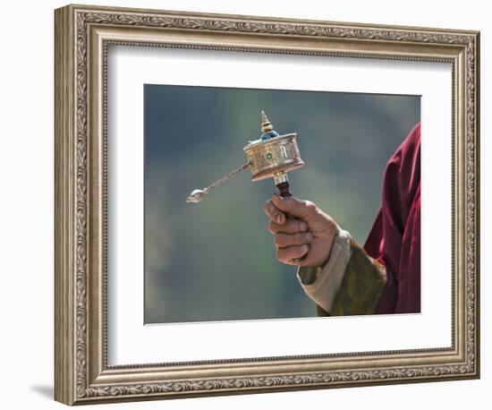 A Buddhist Spins His Hand-Held Prayer Wheel in a Clockwise Direction with the Help of a Weighted Ch-Nigel Pavitt-Framed Photographic Print