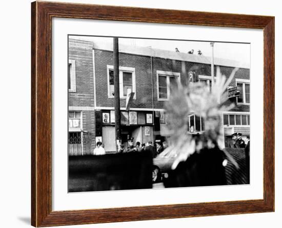 A Bullet Hole Made During an Exchange of Gunfire of LA Police and Black Panthers, Dec 8, 1969-null-Framed Photo