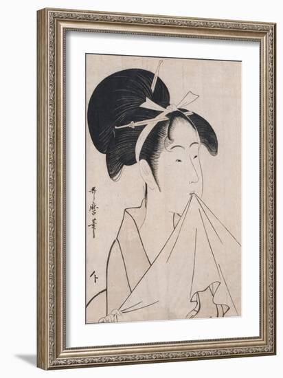 A Bust Portrait of Okita of the Naniwaya Holding a Hand Towel in Her Teeth and Stretching the Cloth-Kitagawa Utamaro-Framed Giclee Print