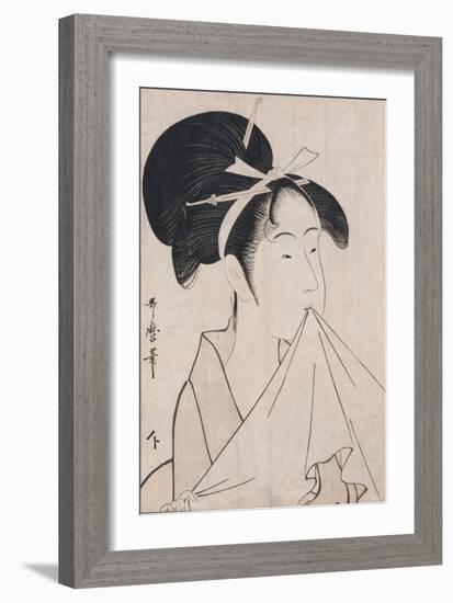 A Bust Portrait of Okita of the Naniwaya Holding a Hand Towel in Her Teeth and Stretching the Cloth-Kitagawa Utamaro-Framed Giclee Print