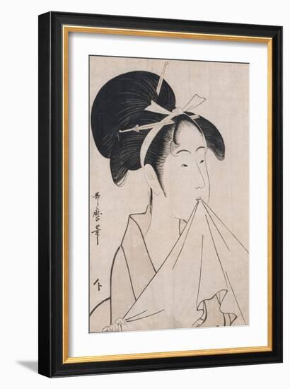 A Bust Portrait of Okita of the Naniwaya Holding a Hand Towel in Her Teeth and Stretching the Cloth-Kitagawa Utamaro-Framed Giclee Print