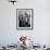 A Butcher Working in the Hungarian Meat Shop-John Phillips-Framed Premium Photographic Print displayed on a wall