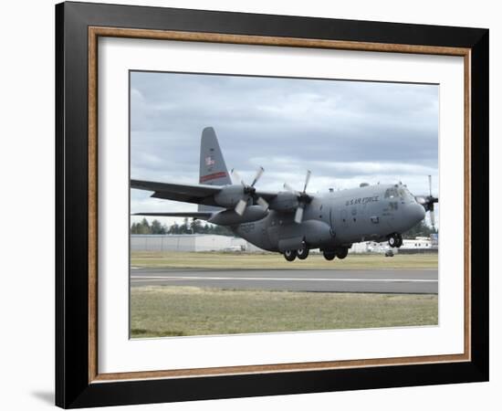 A C-130 Hercules Lands at McChord Air Force Base, Washington-Stocktrek Images-Framed Photographic Print