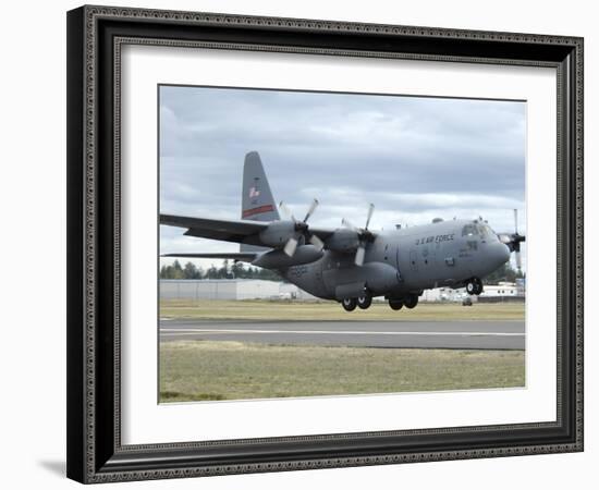 A C-130 Hercules Lands at McChord Air Force Base, Washington-Stocktrek Images-Framed Photographic Print