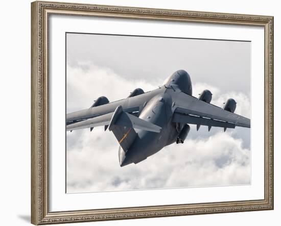 A C-17 Globemaster Flying Above the Clouds over Nellis Air Force Base, Nevada-Stocktrek Images-Framed Photographic Print