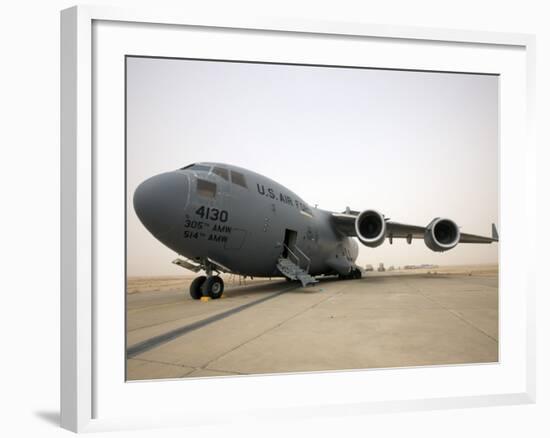 A C-17 Globemaster Iii Sits on the Runway at Cob Speicher, Iraq-null-Framed Photographic Print
