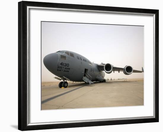 A C-17 Globemaster Iii Sits on the Runway at Cob Speicher, Iraq-null-Framed Photographic Print