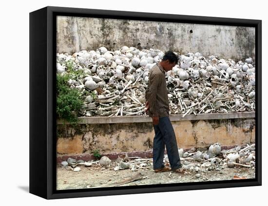 A Cambodian Man Walks Past One of the Many Killing Fields Sites-null-Framed Premier Image Canvas