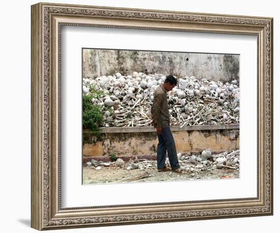 A Cambodian Man Walks Past One of the Many Killing Fields Sites-null-Framed Premium Photographic Print