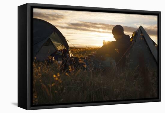 A camper sits in the evening sun, Picws Du, Black Mountain, Brecon Beacons National Park, Wales, Un-Charlie Harding-Framed Premier Image Canvas