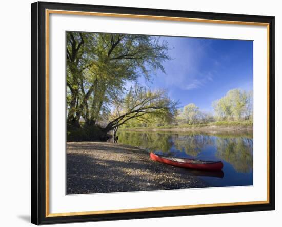 A Canoe rests on the banks of he Connecticut River in Maidstone, Vermont, USA-Jerry & Marcy Monkman-Framed Photographic Print