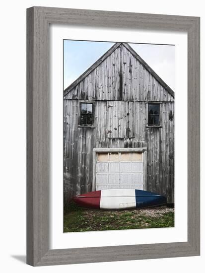 A Canoe Sits In Front Of A Weathered Old Boat House On The Coast Of Maine-Erik Kruthoff-Framed Photographic Print