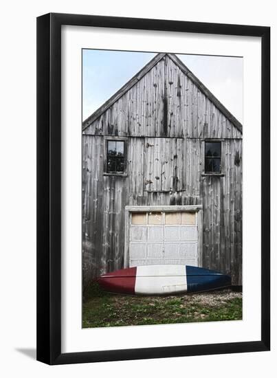 A Canoe Sits In Front Of A Weathered Old Boat House On The Coast Of Maine-Erik Kruthoff-Framed Photographic Print