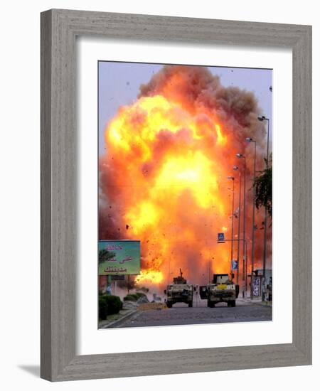 A Car Bomb Explodes-null-Framed Photographic Print