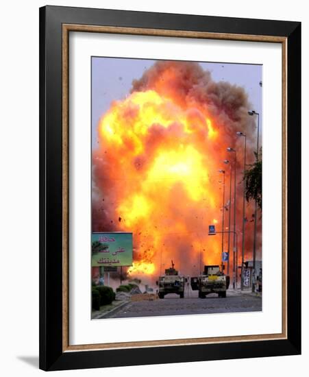 A Car Bomb Explodes-null-Framed Photographic Print