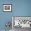 A Cardinal Sits on a Snow-Covered Branch-null-Framed Photographic Print displayed on a wall