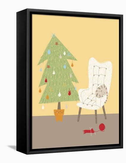 A Cat on a Chair Next to a Christmas Tree-null-Framed Premier Image Canvas