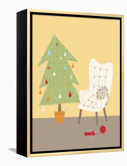 A Cat on a Chair Next to a Christmas Tree-null-Framed Premier Image Canvas