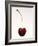 A Cherry Against a White Background-null-Framed Photographic Print