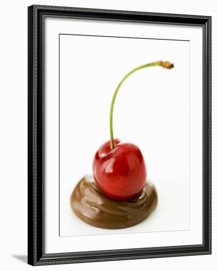 A Cherry on a Blob of Chocolate Sauce-Greg Elms-Framed Photographic Print