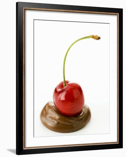 A Cherry on a Blob of Chocolate Sauce-Greg Elms-Framed Photographic Print