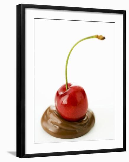 A Cherry on a Blob of Chocolate Sauce-Greg Elms-Framed Photographic Print