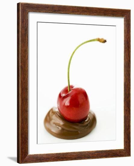 A Cherry on a Blob of Chocolate Sauce-Greg Elms-Framed Photographic Print