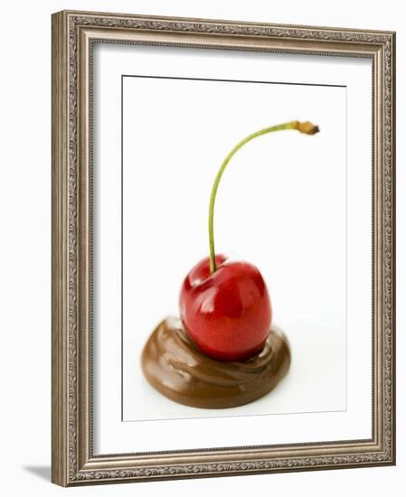 A Cherry on a Blob of Chocolate Sauce-Greg Elms-Framed Photographic Print