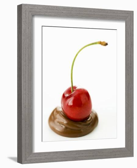 A Cherry on a Blob of Chocolate Sauce-Greg Elms-Framed Photographic Print