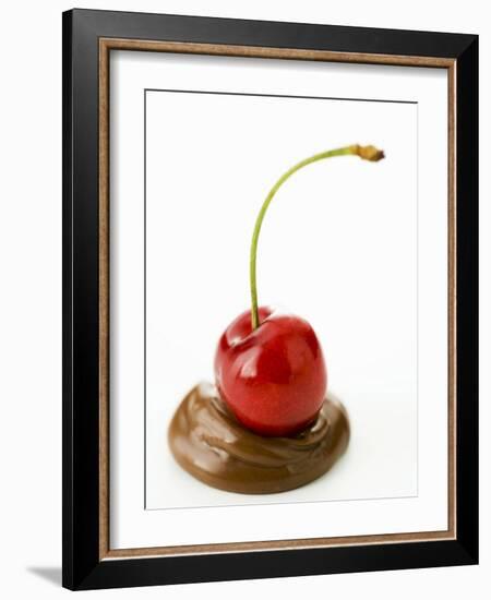 A Cherry on a Blob of Chocolate Sauce-Greg Elms-Framed Photographic Print